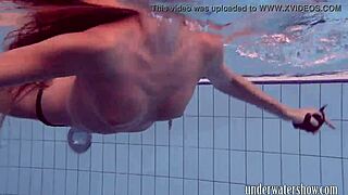 Lucy takes off bikini in the pool