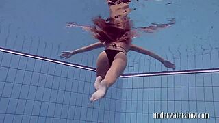 Lucy takes off bikini in the pool