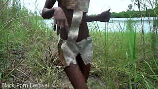 skinny african tribe woman works outdoor in the sun.