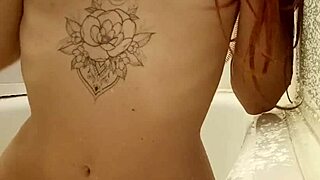 Redhead teen relaxes in the bath 😊