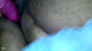 this sexy ebony bbw is playing with her hairy pussy using a vibrator at home