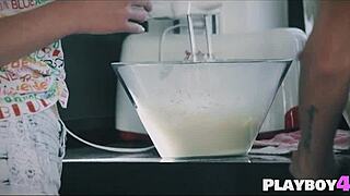 Two hot girls are kissing and fingering in the kitchen