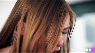 Two hot girls are kissing and fingering in the kitchen