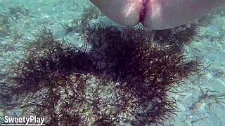 Mature milf enjoys underwater outdoor fun.