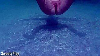 Mature milf enjoys underwater outdoor fun.