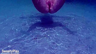 Mature milf enjoys underwater outdoor fun.