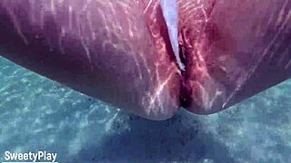 Mature milf enjoys underwater outdoor fun.