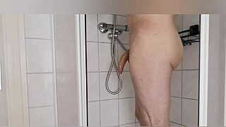 The story of someone shaving their body in the shower, focusing on the bathing process