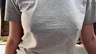 The italian milf with big tits smokes outdoors