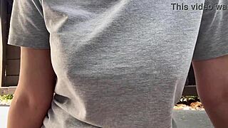 The italian milf with big tits smokes outdoors