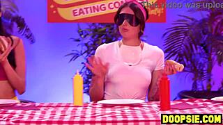 Kinky ebony contestant straps on to pound competitors