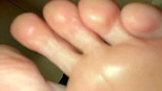 Cute Beautiful Feet Receive Massage In New York Salon