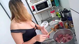 Sarah rosa cooks sexy ground meat with onions in the kitchen