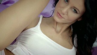 Is this stunning brunette babe masturbating with a dildo?