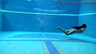 Hungarian Babe Sazan Cheharda Swims Naked in Pool, Teasing with Big Tits and Ass