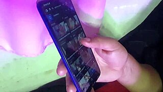 Mature Woman Assists Young Man With Oiled Massage On Bed.