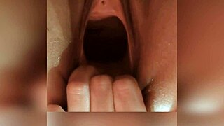 Huge gaping cunt stretched by fingers and hands