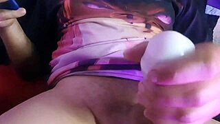 Mature Woman Assists Young Man With Oiled Massage On Bed.