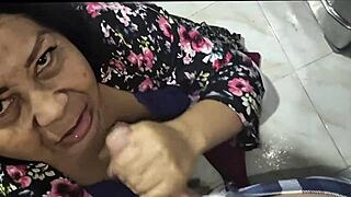 Mature woman surprises young step-nephew during dishwashing.