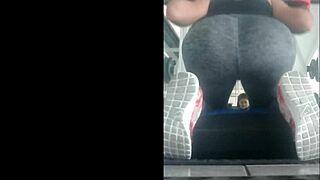 slim mexican teen in leggings bent over in gym