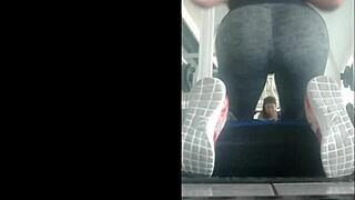 slim mexican teen in leggings bent over in gym