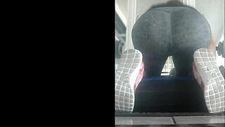 slim mexican teen in leggings bent over in gym