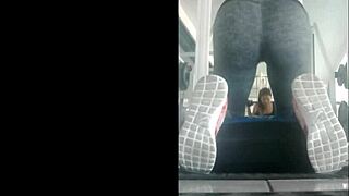 slim mexican teen in leggings bent over in gym