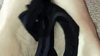 Gretala rubs thong on her sexy barefoot ebony feet