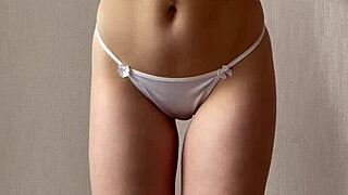 uhh i can't help it this innocent redhead strips her lingerie and skirt just for you...