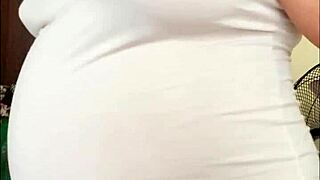 that pregnant arab milf shows off her huge milky belly and boobs on cam like a total slut