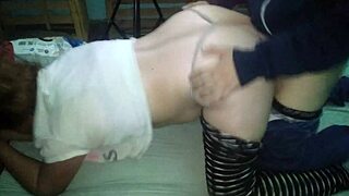 guy pulls down girl's striped leggings and thong for bent over doggy fuck