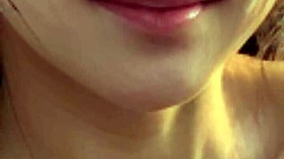 mature model strolls beach in suggestive pose