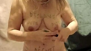 French Milf Maid Bound in Public Toilet Chains Flashes Natural Tits for Humiliating Outdoor Exposure