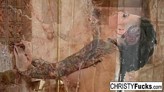Christy Mack pounds her pussy hard in steamy shower