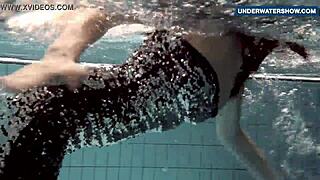 Russian Teen Flashes Massive Tits Underwater at Beach Pool Making Viewers Horny