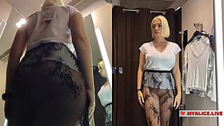 Heart races spying busty blonde trying see-through outfits in dressing room mirror!
