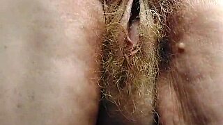 granny stuffs cucumber deep into hairy mature german beaver pussy