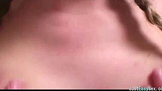 pigtailed brunette casually bounces and squeezes her huge tits around