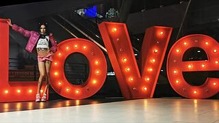 Crossdressed transsexual parades mini-skirt and bulging panties