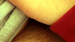 she slips hand into pajamas touching herself to orgasm in bedroom