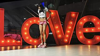 Crossdressed transsexual parades mini-skirt and bulging panties