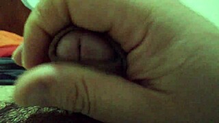 Guy strokes cock during solo massage session