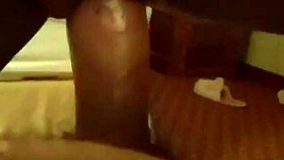 ebony beauty spits on big cock before riding it wildly