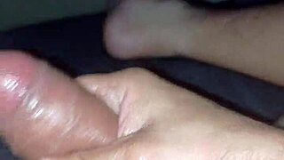 guy grips thick cock tight jerking off hard and fast.