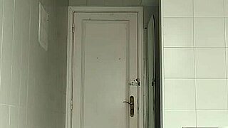 check out this sexy guy in black beach shorts hitting the bathroom for a close shave routine