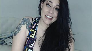 Curvy brunette teases curves on cam