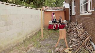 Lumberjack pounds two tattooed chicks bent over in shed doggystyle