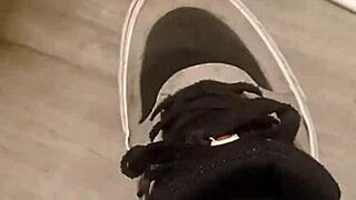 Friend trashes sneakers in playful foot adventure