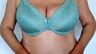 busty granny maria swaps beige lingerie for mint green titty tease show