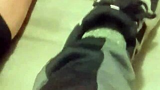 Friend trashes sneakers in playful foot adventure